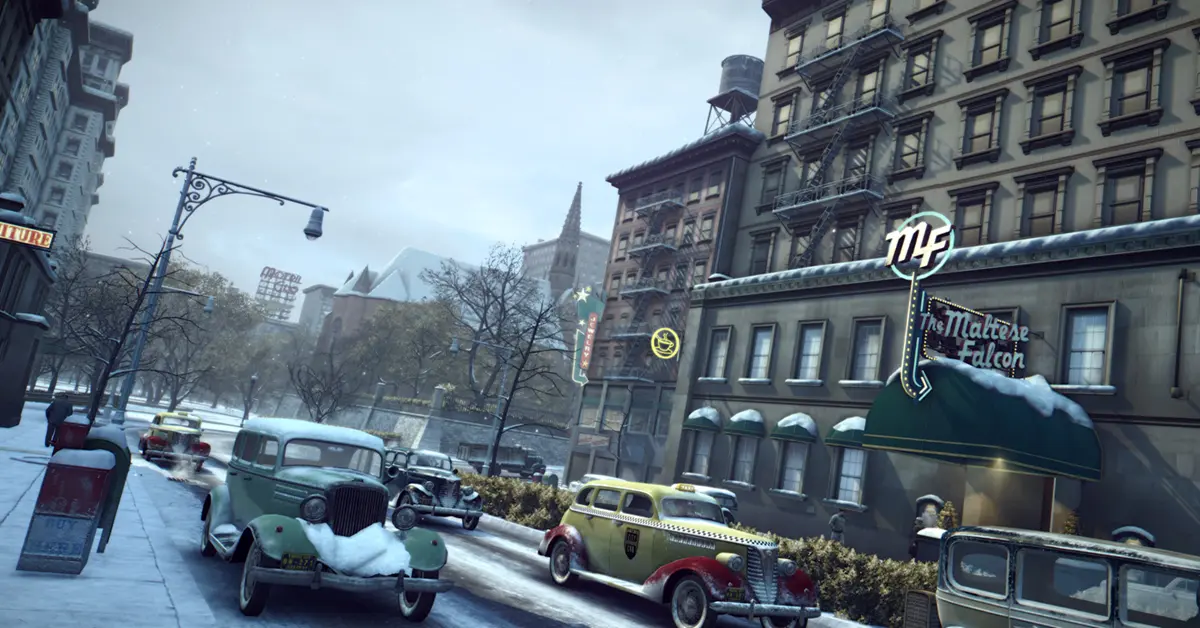 Vito Scaletta caminando por una calle nevada en Empire Bay en Mafia II: Definitive Edition