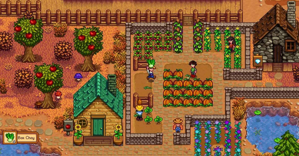 Una tranquila granja digital en Stardew Valley rodeada de árboles otoñales y calabazas cosechadas.