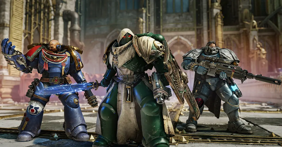 Un escuadrón de tres jugadores de Space Marines manteniendo la posición contra las fuerzas alienígenas